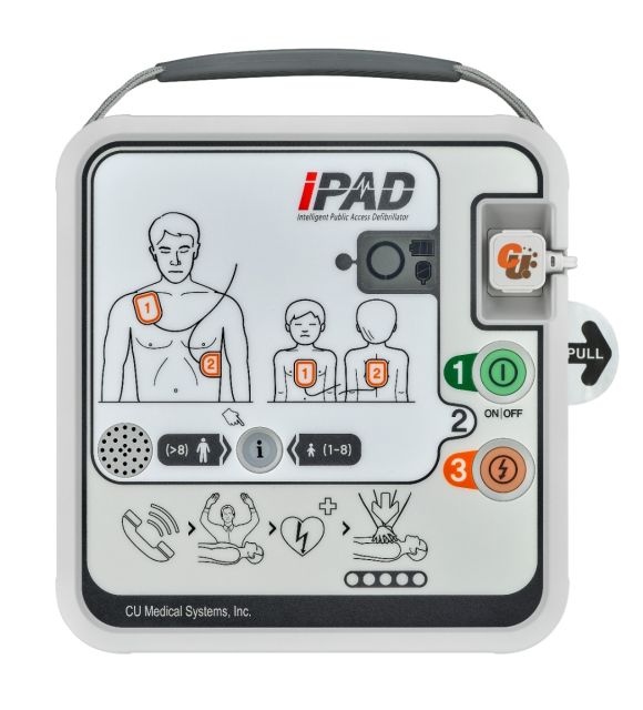 The image displays an IPAD SPR Semi-Automatic Defibrillator from CU Medical Systems, Inc. This defibrillator features a clear and straightforward design for emergency use. It has a large visual instruction panel depicting a man and a child, each with numb